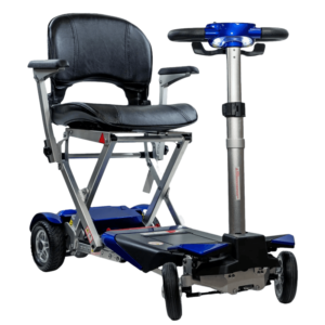 A compact, foldable mobility scooter in blue and black with a cushioned seat and backrest. The scooter features four wheels, a handlebar for steering, a folding mechanism, and LED front lights for visibility.