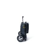 Isolated view of the eFOLDi Explorer, highlighting its folded upright position, demonstrating the scooter's space-saving design for storage.